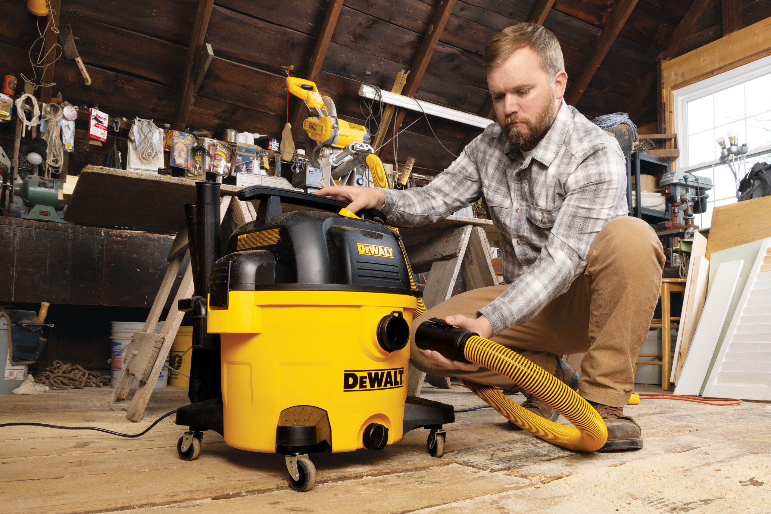 Nathan Gilbert setting up a Dewalt shop vac