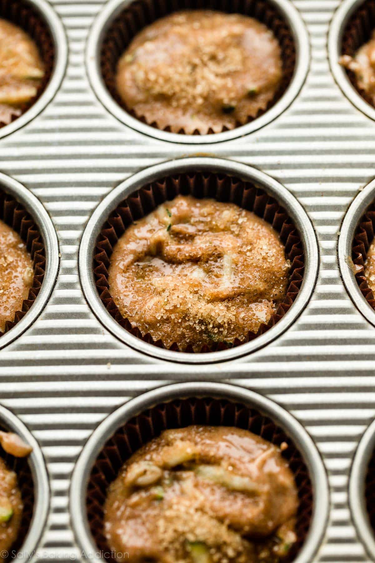 muffin batter in lined muffin pan