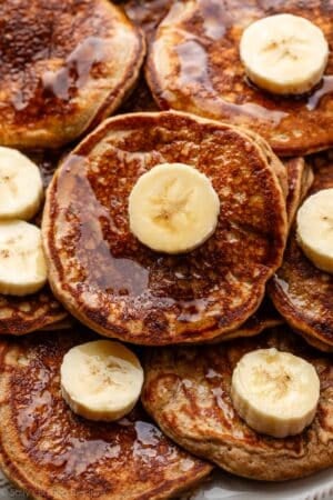 plate of banana pancakes close up.