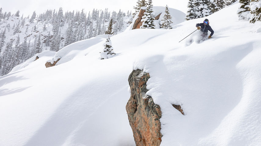 Female skier making turn in fresh snow in Spellbound