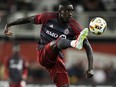 Toronto FC's Prince Owusu controls the ball against the New England Revolution during second half MLS soccer action in Toronto on Saturday, April 20, 2024. Toronto FC, mired in a four-game losing streak and seven-game winless run (0-5-2), look to turn the tide when Orlando City visits Wednesday. Orlando has its own problems, having won just one of its last seven outings (1-4-2).