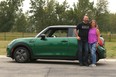 Kerry and Steve Lockhart pose with the one millionth Mini 3 door sold globally.