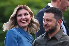Ukrainian President Volodymyr Zelenskiy and his wife, the First Lady of Ukraine, Olena Zelenska, participate in a family photo before a dinner hosted by Lithuanian President Gitanas Nauseda at the presidential palace during the NATO Summit, on July 11, 2023 in Vilnius, Lithuania