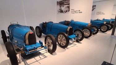 A row of racing Bugattis in the French National Car Museum in Mulhouse, France