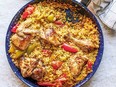 Paula's arroz con pollo in a blue pan.