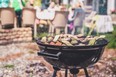 Simple round charcoal barbecue gril closeup.