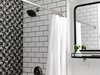 Bathroom shower with black and white tiles