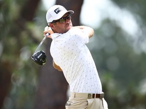 Corey Conners plays his shot from the 11th tee during a practice round prior to the U.S. Open at Pinehurst Resort in Pinehurst, N.C., Friday, June 12, 2024.