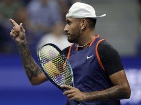 Nick Kyrgios celebrates during his match against Daniil Medvedev at the U.S. Open in 2022.