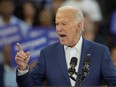 U.S. President Joe Biden gestures during his remarks at Renaissance High School during a Friday, July 12, 2024, campaign event in Detroit.