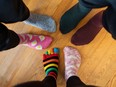 Funny family legs in mismatched socks