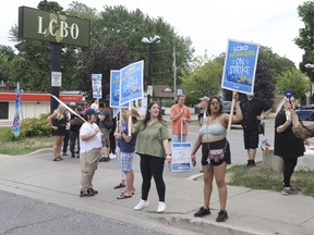 Striking workers picketed outside an LCBO location on Danforth Ave. near Victoria Park Ave. in Scarborough on Friday, July 5, 2024.