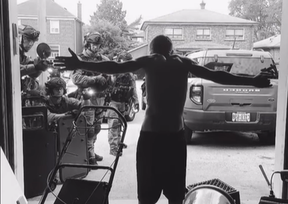 In a screengrab from video posted to social media, a man appears to be arrested by Toronto Police.