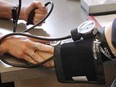 .A patient has her blood pressure checked