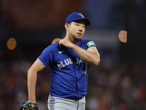 Pitcher Yusei Kikuchi #16 of the Toronto Blue Jays looks on after leaving the game in the bottom of the eighth inning against the San Francisco Giants at Oracle Park on July 09, 2024 in San Francisco, California.