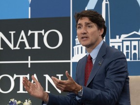 Prime Minister Justin Trudeau delivers remarks before meeting with New Zealand Prime Minister Christopher Luxon at the NATO summit in Washington, Wednesday, July 10, 2024.