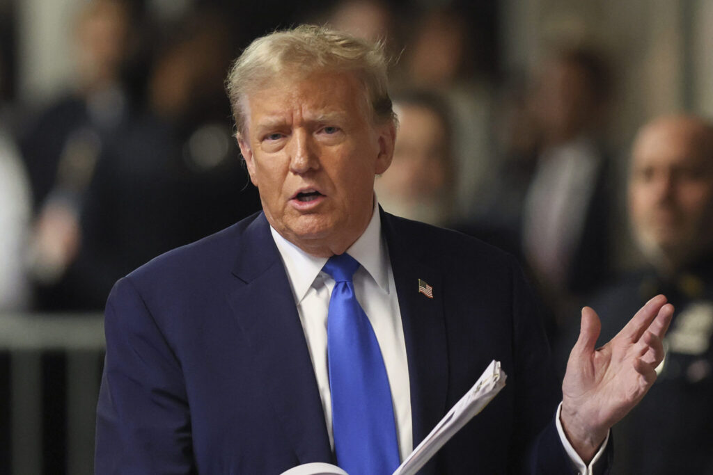 Former President Donald Trump speaks to the media as he leaves court for the day at Manhattan Criminal Court on April 18, 2024, in New York City. Trump was charged with 34 counts of falsifying business records, which prosecutors say was an effort to hide a potential sex scandal, both before and after the 2016 presidential election. (Brendan McDermid-Pool/Getty Images)