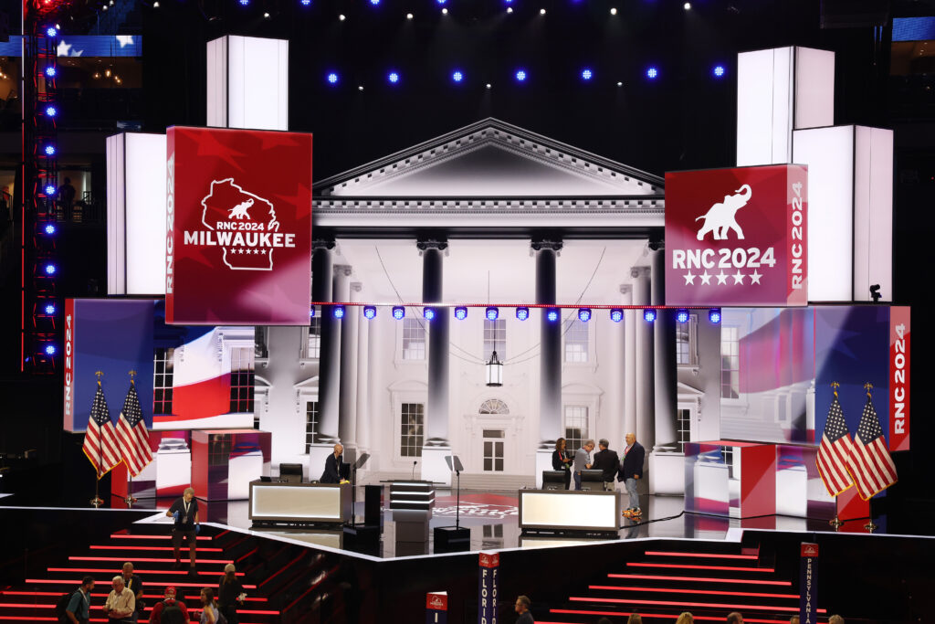 Workers prepare the stage on July 13, 2024, for the Republican National Convention at the Fiserv Forum in Milwaukee, Wisconsin. (Scott Olson/Getty Images)