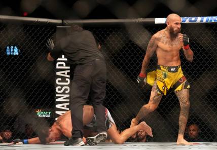 Aug 13, 2022; San Diego, California, USA; Marlon Vera (red gloves) reacts after defeating Dominick Cruz (blue gloves) during UFC Fight Night at Pechanga Arena. Mandatory Credit: Joe Camporeale-USA TODAY Sports