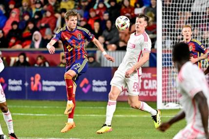 Mar 30, 2024; Sandy, Utah, USA; Real Salt Lake midfielder Bode Hidalgo (19) and St. Louis CITY SC midfielder Chris Durkin (8) battles for possession during the first half at America First Field. Mandatory Credit: Christopher Creveling-USA TODAY Sports