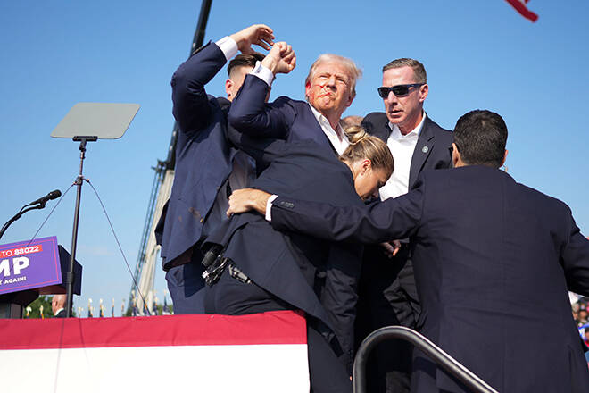 Trump ‘fine’ after being grazed by bullet in assassination attempt at rally