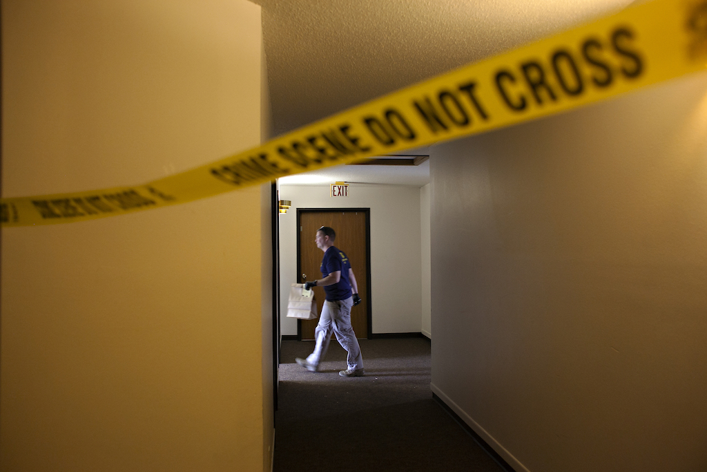 An FBI investigator at a crime scene.