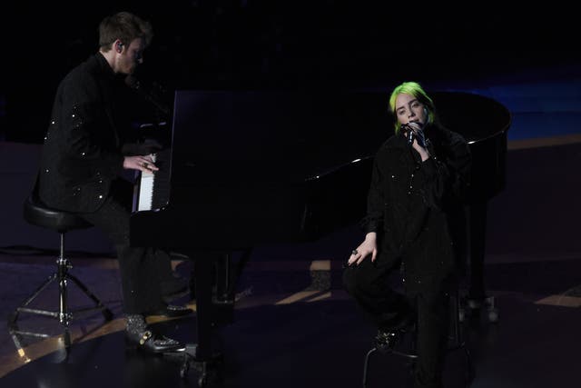 Billie Eilish and Finneas O’Connell perform during the memoriam tribute at the Oscars on 9 February 2020 in Los Angeles, California