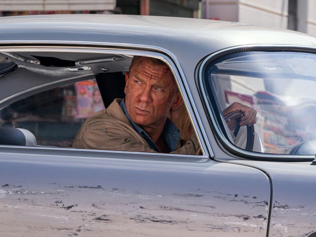 <p>Daniel Craig drives through Italy in a scene from his final 007 film, ‘No Time to Die’ </p>