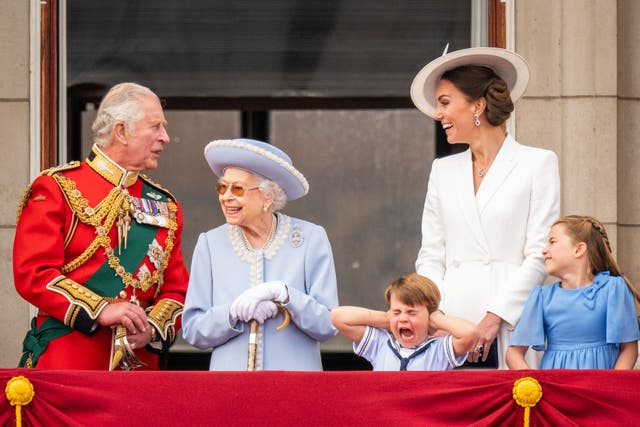 The then Prince of Wales, the Queen, Prince Louis, the then Duchess of Cambridge and Princess Charlotte on the balcony of Buckingham Palace (Aaron Chown/PA)