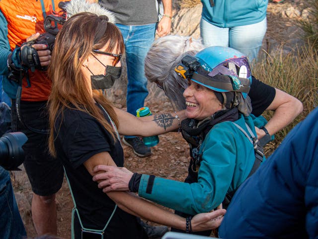 <p>Beatriz Flamini is helped above ground from the cave near at Motril near Granada, Spain</p>