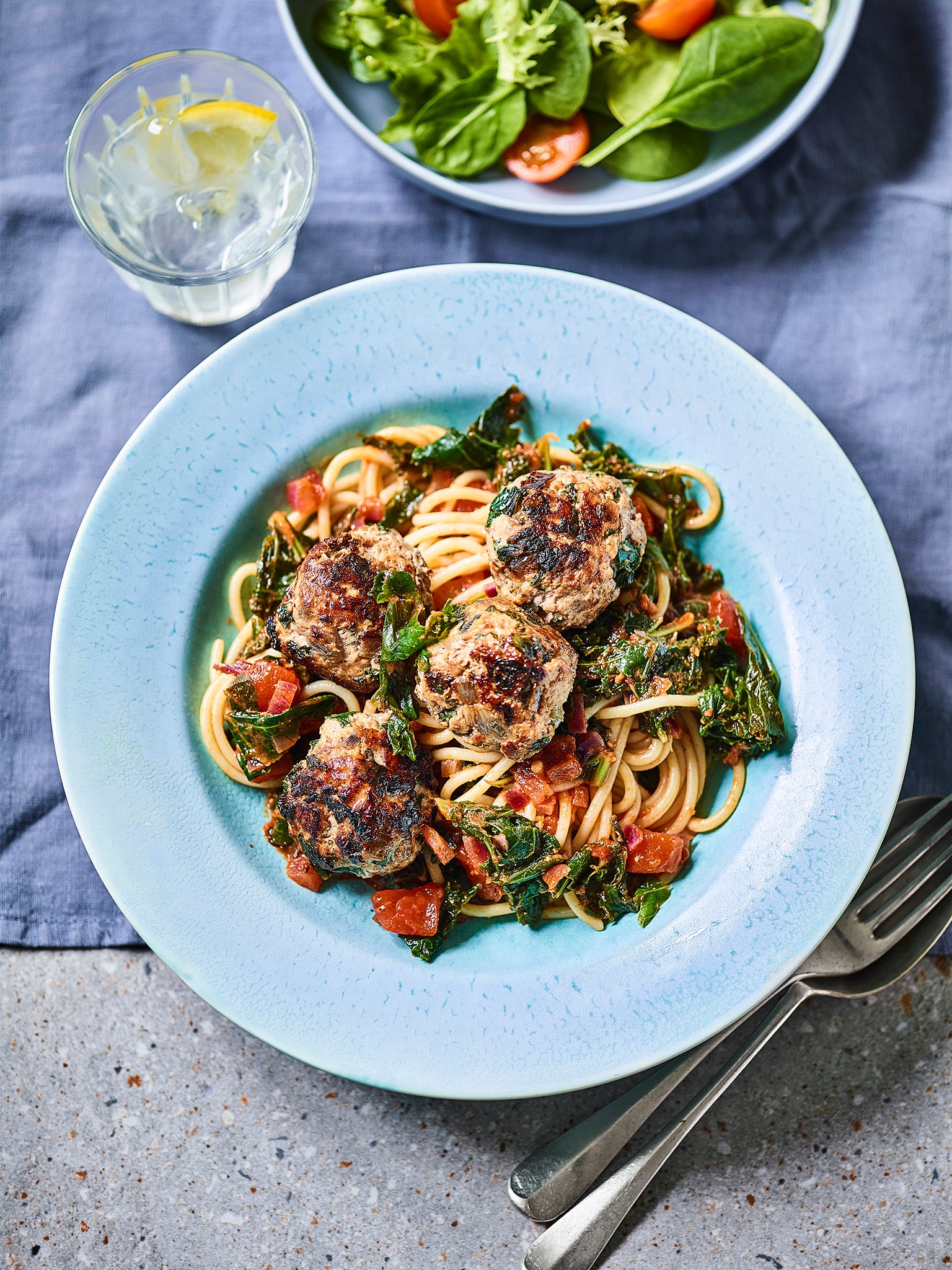Introduce the kids to wonderfully leafy green kale in the family-friendlypork and kale meatballs with spaghetti