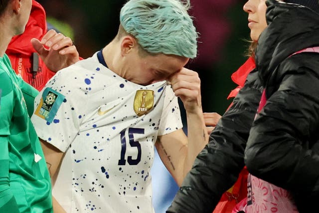 <p>Megan Rapinoe sobs after the US team was knocked out of the World Cup </p>