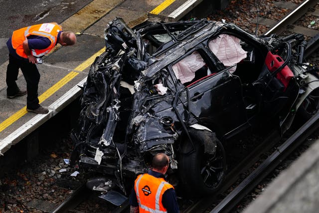 The car ended up on the tracks at Park Royal Tube station, in west London (Victoria Jones/PA)