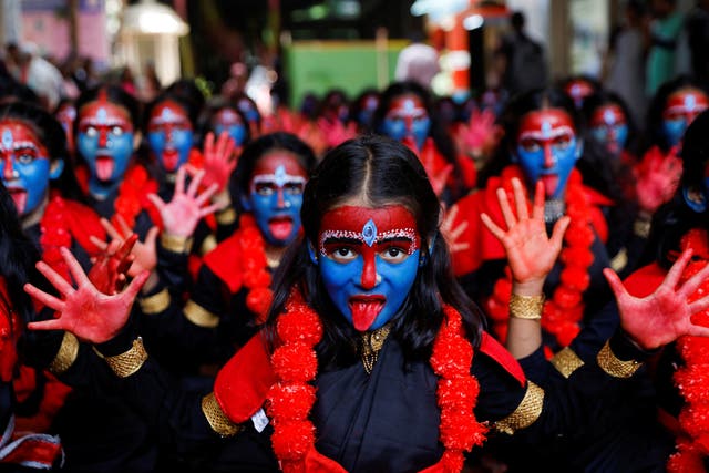 <p>Students made up to resemble the Hindu goddess Kali take part in an event ahead of the Janmashtami festival in Mumbai, India</p>