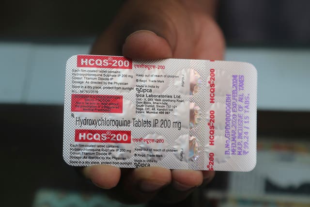 <p>A chemist displays hydroxychloroquine tablets in Mumbai, India, in May 2020</p>