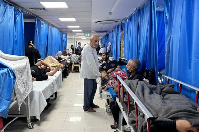 <p>Patients and internally displaced people are pictured at al-Shifa hospital</p>