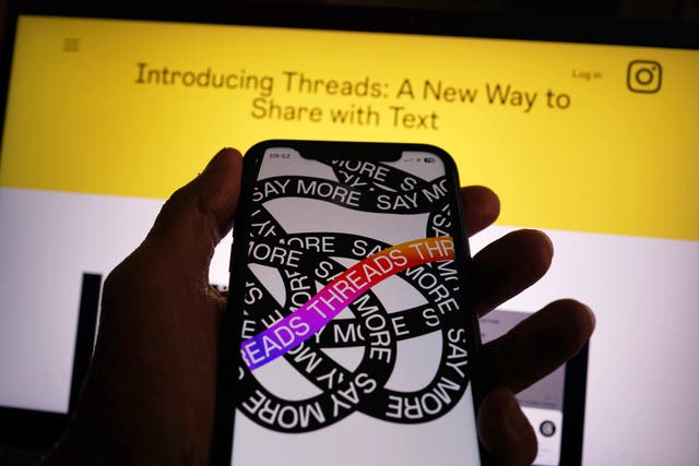 <p>An Apple iPhone screen showing the Threads app</p>