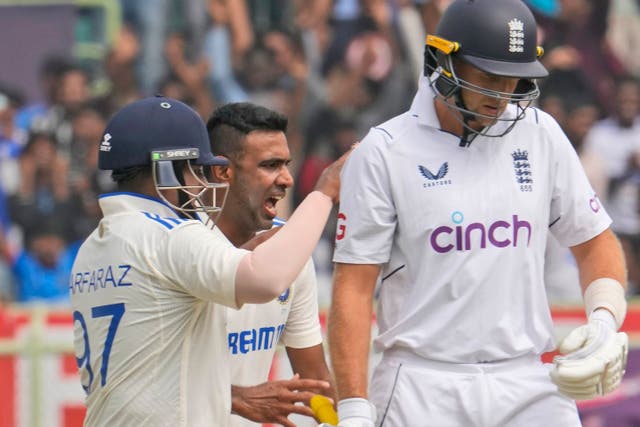 India’s Ravichandran Ashwin, centre, celebrates the wicket of England’s Joe Root on the fourth day of the second match between India and England in Visakhapatnam, India (Manish Swarup, AP)