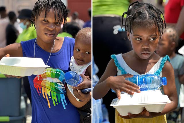 <p>Dovilien My Love (left) with her child Laurance Fleristalle, and six-year-old Ainara receive hot meals and water from the WFP </p>