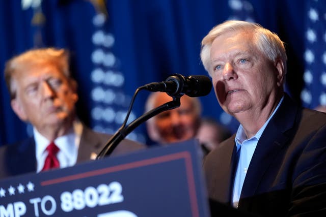 <p>Lindsey Graham with Donald Trump at a Republican primary event in February </p>