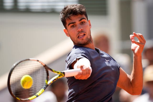 Carlos Alcaraz cruised into the second round (AP Photo/Christophe Ena)