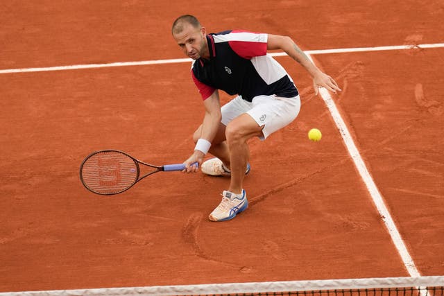 Dan Evans (pictured) lost against Denmark’s Holger Rune (Christophe Ena/AP)