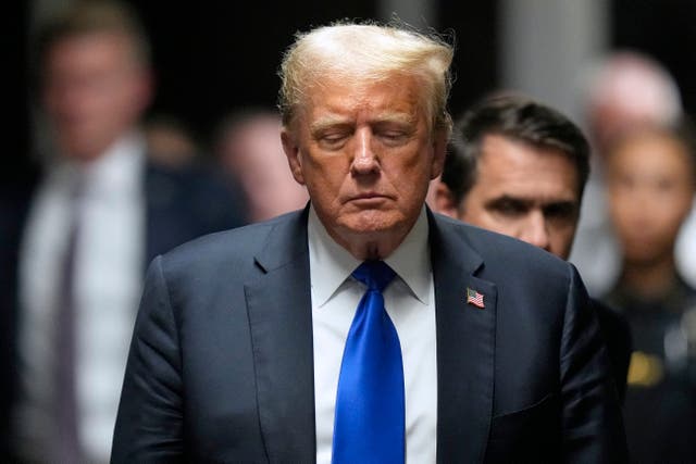 <p>Former US President and Republican presidential candidate Donald Trump exits the courtroom after he was convicted in his criminal trial at Manhattan Criminal Court </p>