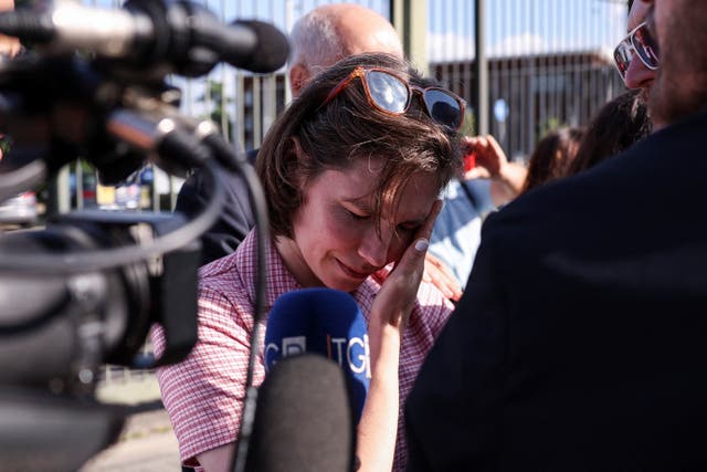 <p>Amanda Knox reacts on the day of the verdict in the slander case at Italy Court in Florence</p>