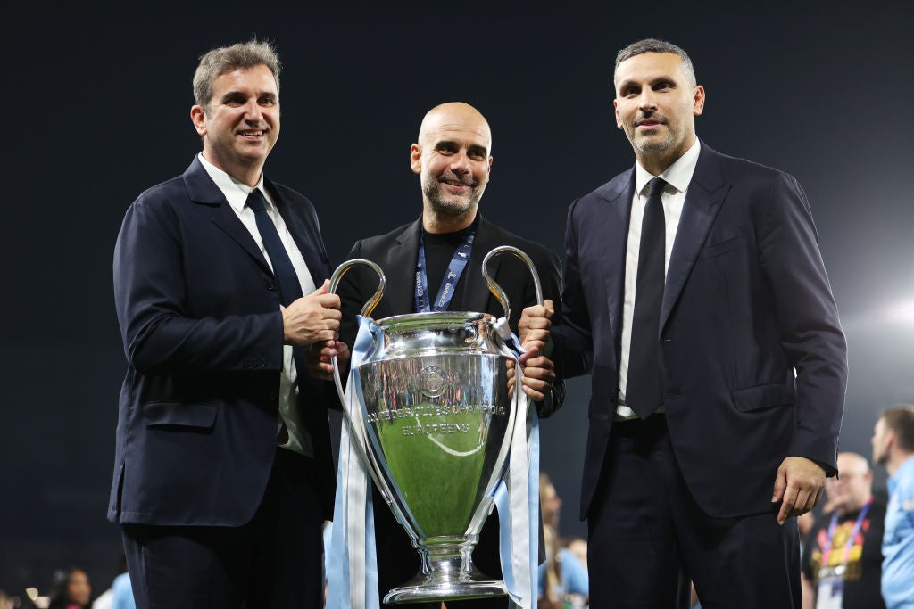 Ferran Soriano, Pep Guardiola, and Khaldoon Al Mubarak, Chairman of Manchester City, celebrate the club’s first Champions League