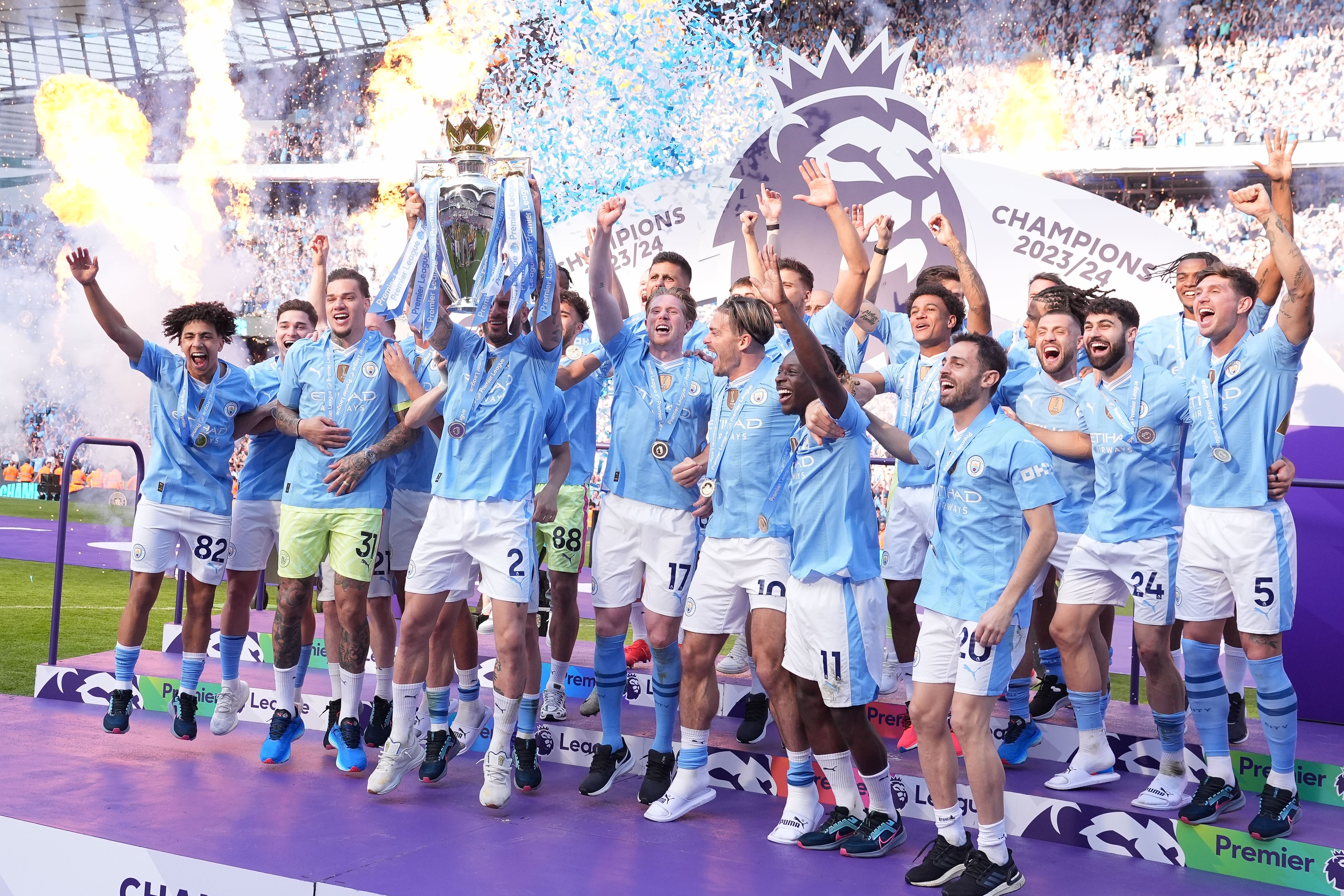 Manchester City celebrate a fourth successive Premier League title