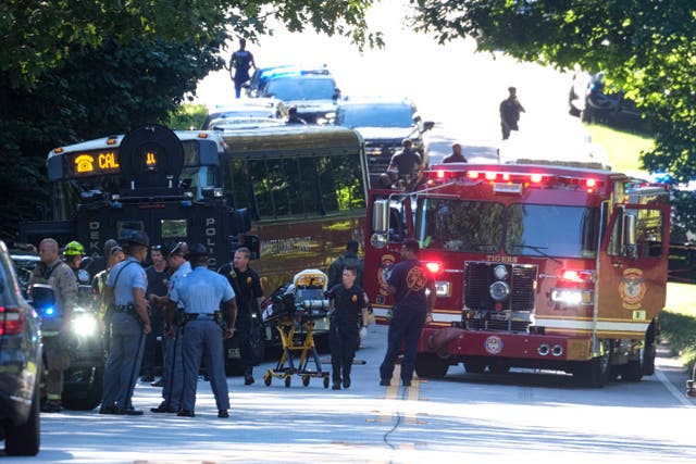 <p>A Gwinnett County, Ga. commuter bus sits in the road where it was stopped in Smoke Rise, Ga., on Tuesday, June 11, 2024</p>