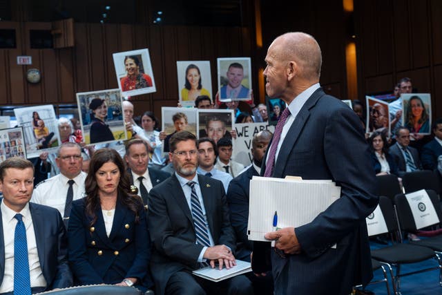 <p>With protesters in the audience, Boeing CEO Dave Calhoun arrives to testify before the Senate Homeland Security and Governmental Affairs Subcommittee on Investigations </p>