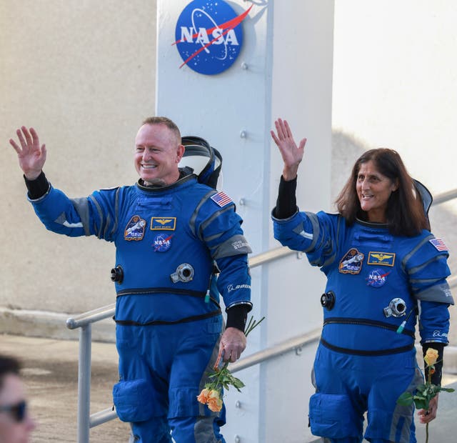 <p>Butch Wilmore (left) and Suni Williams (right) wave just before taking off in the Boeing Starliner spacecraft on June 5. Now, officials say their return to Earth will be delayed until at least June 26</p>
