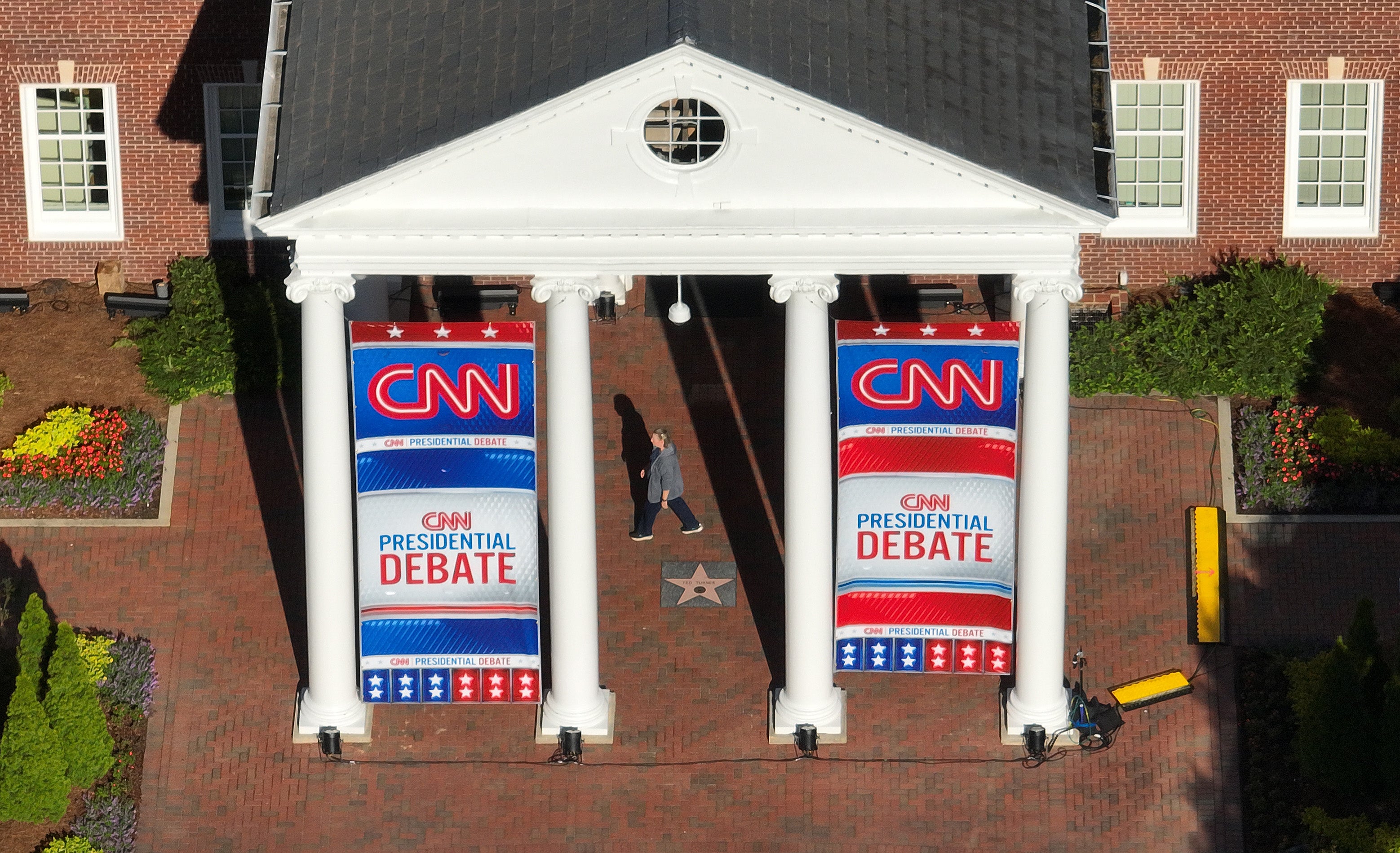 Signage for a CNN presidential debate is seen outside of their studios on June 26, 2024 in Atlanta, Georgia